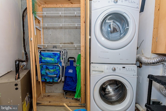 11500 Coastal Hwy Unit 317, Ocean City, MD 21842 - washroom with stacked washer and dryer and laundry area