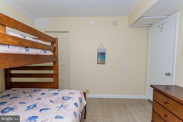 11500 Coastal Hwy Unit 317, Ocean City, MD 21842 - unfurnished bedroom featuring baseboards and light wood-type flooring