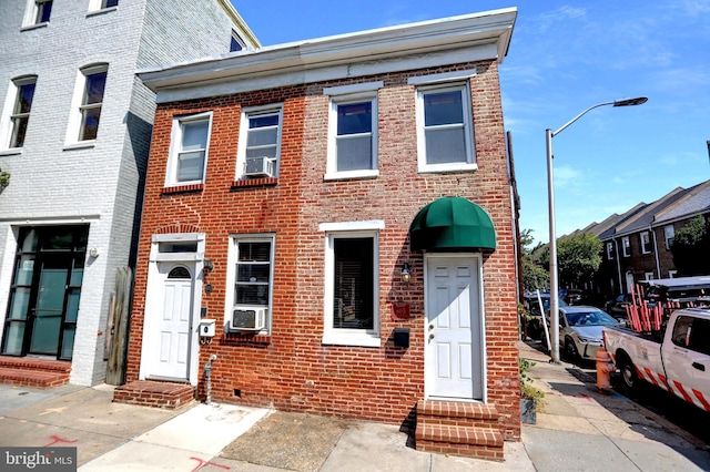 605 S Washington St, Baltimore, MD 21231 - multi unit property with entry steps, brick siding, and cooling unit