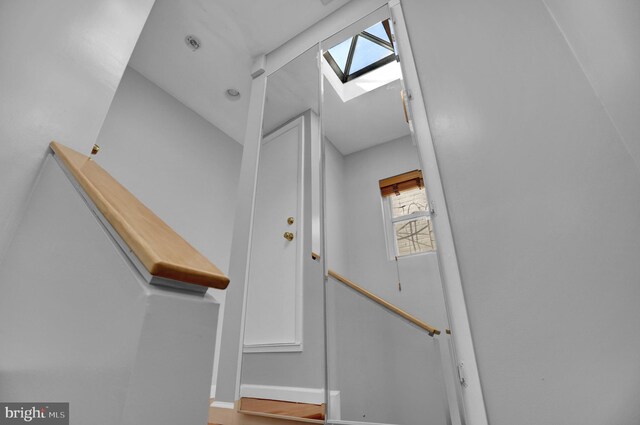 605 S Washington St, Baltimore, MD 21231 - stairway featuring a skylight