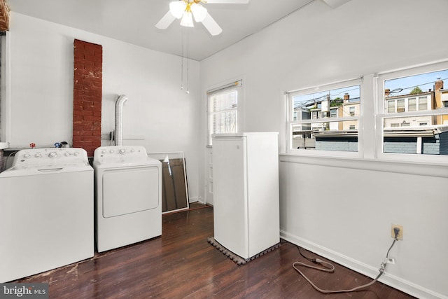 560 25th Pl NE, Washington, DC 20002 - washroom with laundry area, ceiling fan, separate washer and dryer, baseboards, and wood finished floors