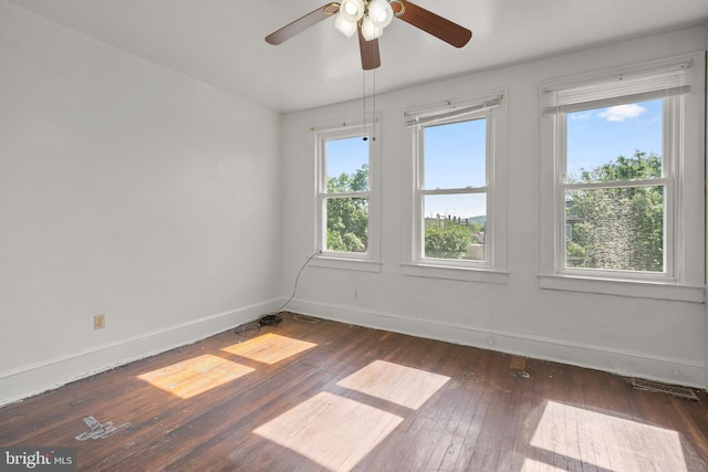 560 25th Pl NE, Washington, DC 20002 - empty room with baseboards, a ceiling fan, dark wood-style flooring, and visible vents