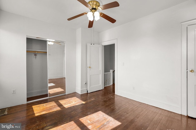 560 25th Pl NE, Washington, DC 20002 - unfurnished bedroom with a closet, a ceiling fan, baseboards, and hardwood / wood-style flooring