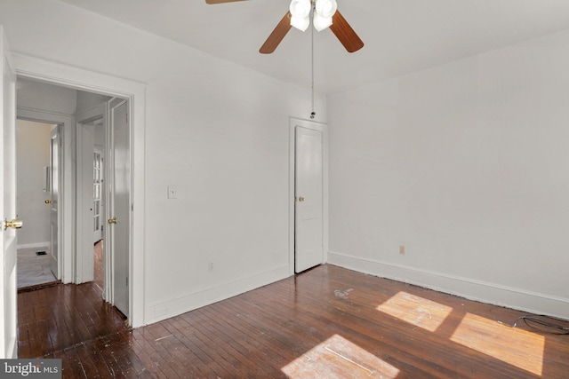 560 25th Pl NE, Washington, DC 20002 - unfurnished bedroom with baseboards, a ceiling fan, and hardwood / wood-style flooring
