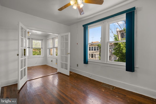 560 25th Pl NE, Washington, DC 20002 - spare room with baseboards, french doors, and hardwood / wood-style flooring