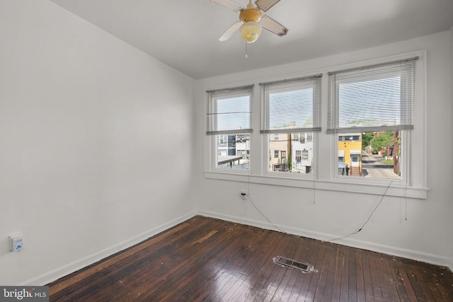 560 25th Pl NE, Washington, DC 20002 - empty room featuring baseboards, ceiling fan, dark wood-style floors, and visible vents