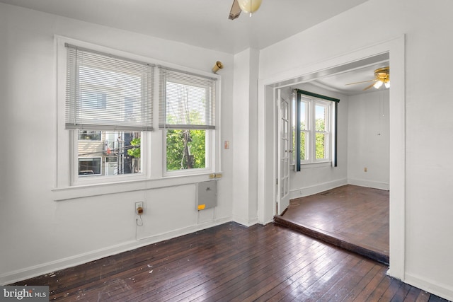 560 25th Pl NE, Washington, DC 20002 - spare room with baseboards, a ceiling fan, and dark wood-type flooring