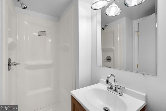 560 25th Pl NE, Washington, DC 20002 - bathroom featuring vanity and a shower