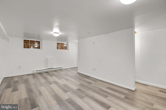 560 25th Pl NE, Washington, DC 20002 - finished below grade area with baseboards, baseboard heating, and wood finished floors