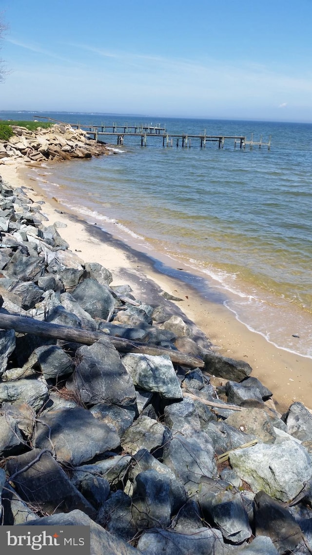 property view of water featuring a view of the beach