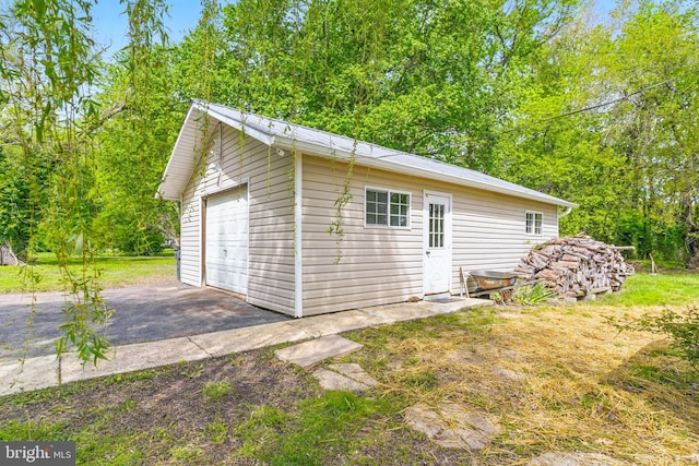 exterior space featuring aphalt driveway