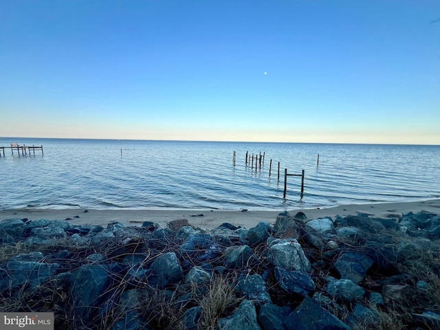 view of dock with a water view