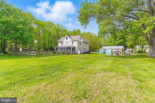 view of yard featuring fence