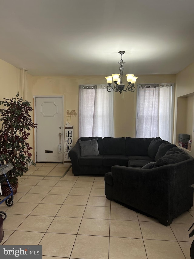 6700 Marsden St, Philadelphia, PA 19135 - living room with a notable chandelier and light tile patterned floors
