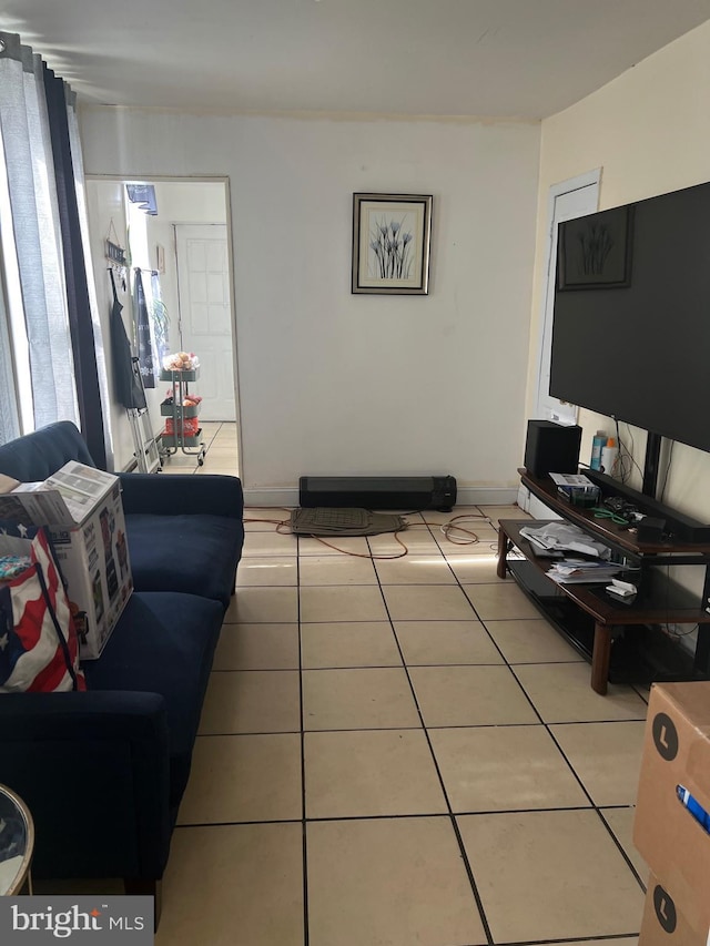 6700 Marsden St, Philadelphia, PA 19135 - living room with baseboards and light tile patterned floors