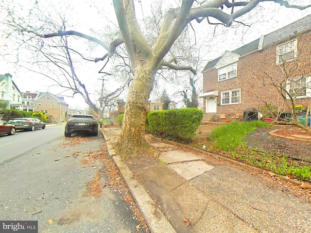 2710 N 47th St, Philadelphia, PA 19131 - view of asphalt road with curbs, sidewalks, and a residential view