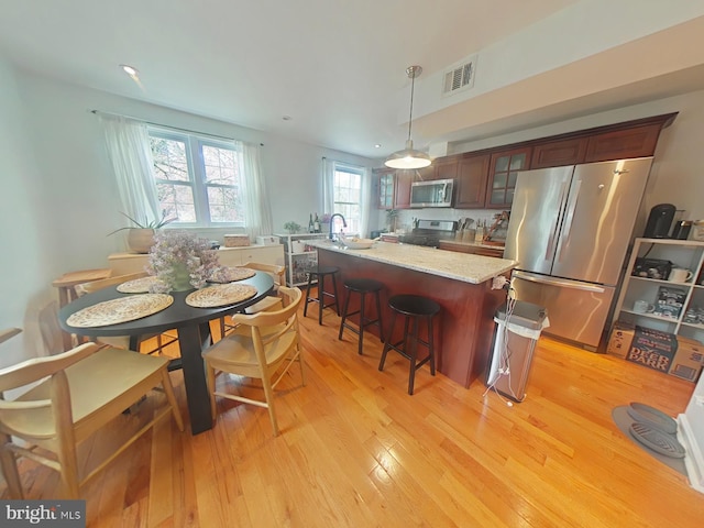 2710 N 47th St, Philadelphia, PA 19131 - dining room with light wood-style floors and recessed lighting