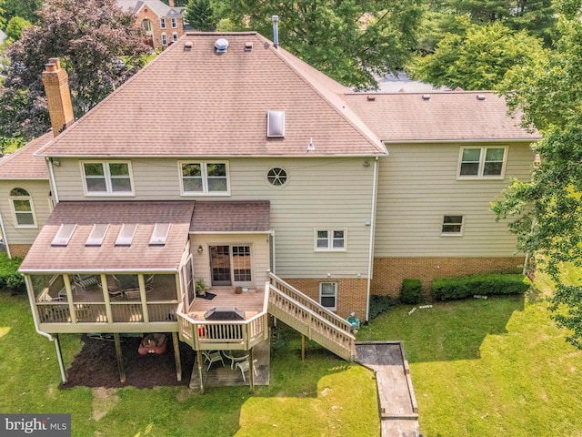 608 Silverstone Ct, Silver Spring, MD 20905 - rear view of house with a chimney, a yard, a wooden deck, and a shingled roof