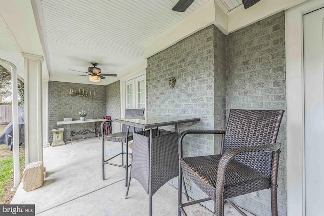 view of patio / terrace featuring ceiling fan