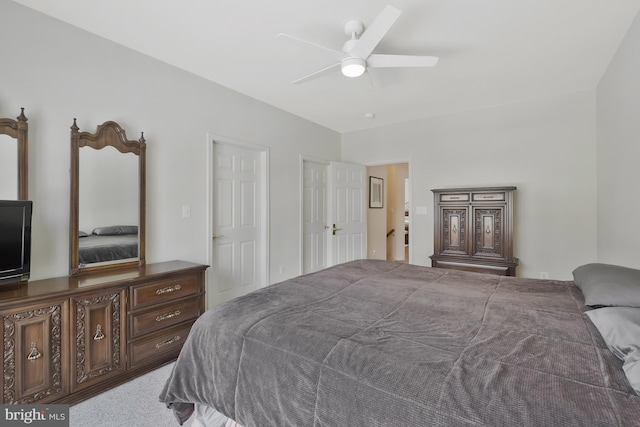 bedroom with carpet floors and a ceiling fan