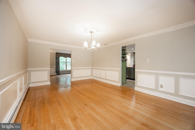304 King Rd, West Chester, PA 19380 - empty room featuring an inviting chandelier, a decorative wall, a baseboard radiator, and crown molding