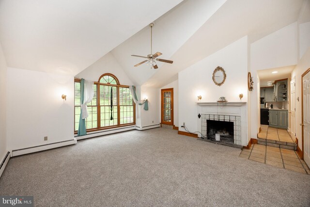 304 King Rd, West Chester, PA 19380 - unfurnished living room with high vaulted ceiling, ceiling fan, carpet floors, baseboards, and a tiled fireplace