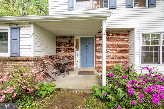 304 King Rd, West Chester, PA 19380 - doorway to property with a porch and brick siding