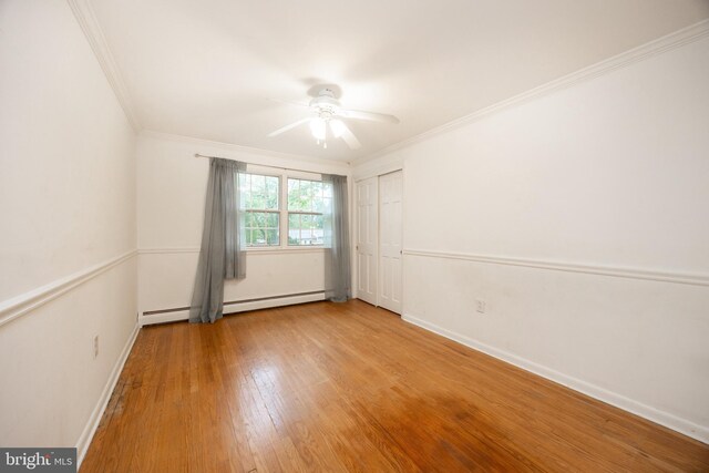 304 King Rd, West Chester, PA 19380 - unfurnished room with wood finished floors, a ceiling fan, baseboards, a baseboard heating unit, and ornamental molding