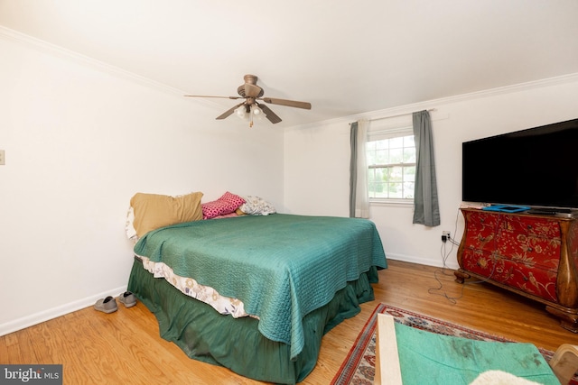 304 King Rd, West Chester, PA 19380 - bedroom featuring ornamental molding, baseboards, a ceiling fan, and wood finished floors
