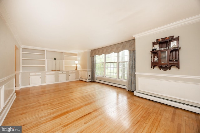 304 King Rd, West Chester, PA 19380 - unfurnished living room featuring built in features, ornamental molding, baseboard heating, and wood finished floors