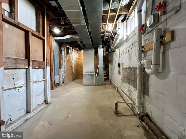unfinished basement with heating unit