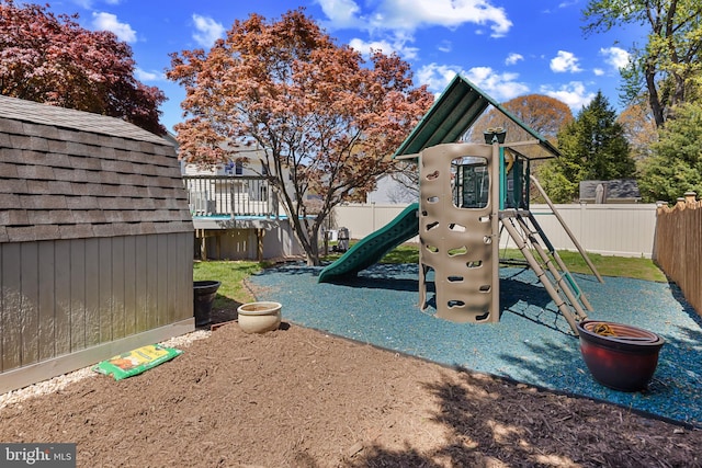 view of jungle gym with fence