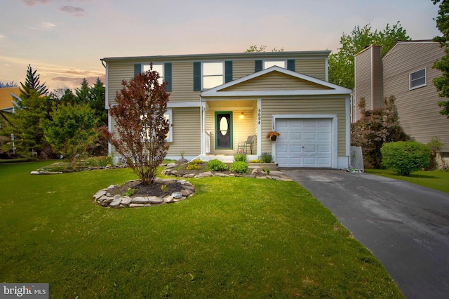 5694 Singletree Dr, Frederick, MD 21703 - traditional-style home featuring a garage, a front lawn, and driveway