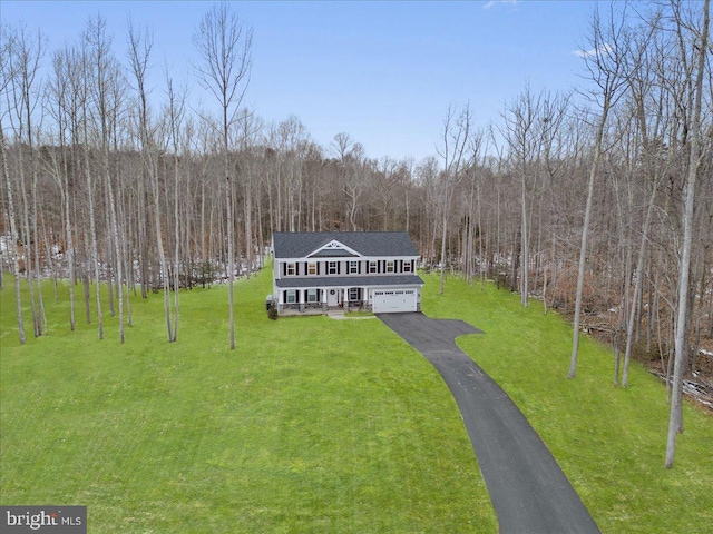 bird's eye view featuring a forest view