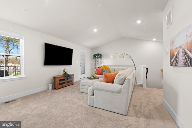 living area with vaulted ceiling, carpet flooring, visible vents, and recessed lighting