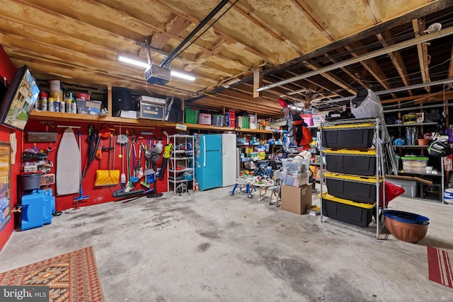 garage featuring a garage door opener