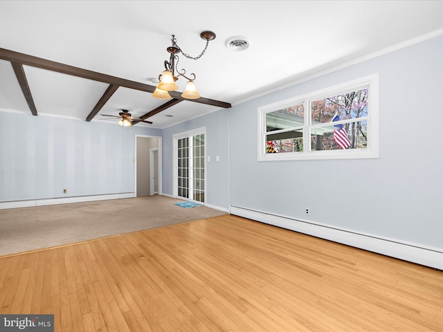 unfurnished living room with baseboard heating, a ceiling fan, visible vents, beam ceiling, and hardwood / wood-style flooring