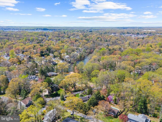 aerial view featuring a view of trees