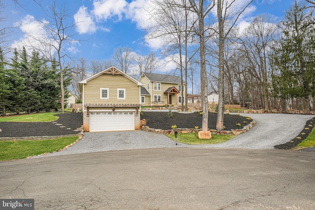 6750 Stonehurst Ct, Warrenton, VA 20187 - view of front of house featuring gravel driveway and a garage