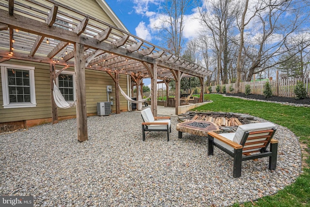 6750 Stonehurst Ct, Warrenton, VA 20187 - view of patio / terrace with a pergola, an outdoor fire pit, and central air condition unit