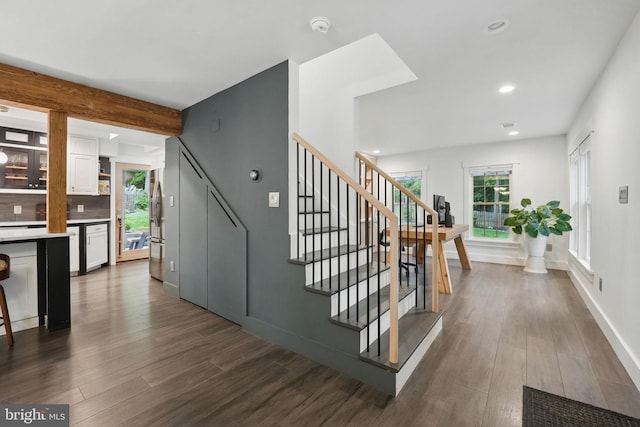 6750 Stonehurst Ct, Warrenton, VA 20187 - stairs with wood finished floors, recessed lighting, and baseboards