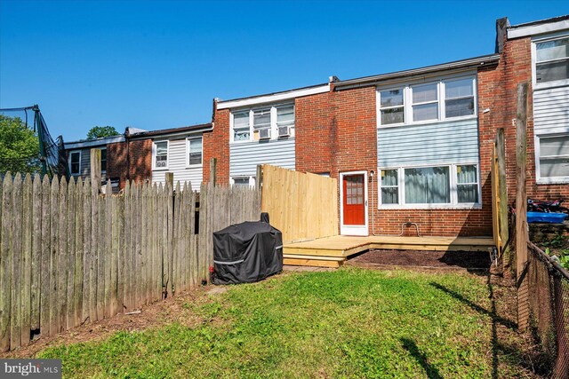 421 Burbank Ct, Baltimore, MD 21227 - back of property with brick siding and a deck