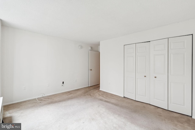 1420 Locust St Unit 6Q, Philadelphia, PA 19102 - unfurnished bedroom featuring carpet floors and a closet
