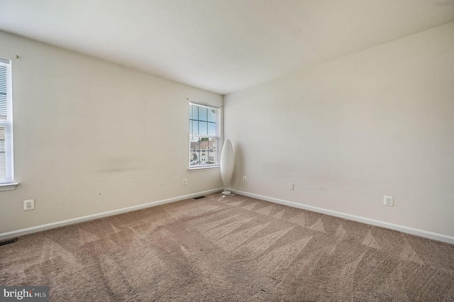 720 Birch Tree Ln, Smyrna, DE 19977 - carpeted spare room with baseboards