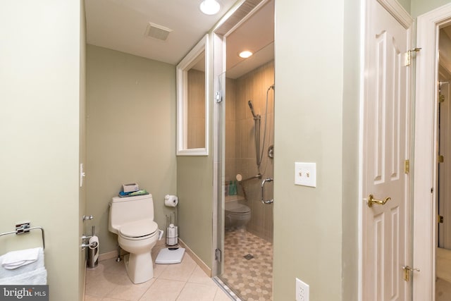 14 Komen Ct, Sellersville, PA 18960 - bathroom featuring a shower stall, visible vents, toilet, tile patterned floors, and baseboards