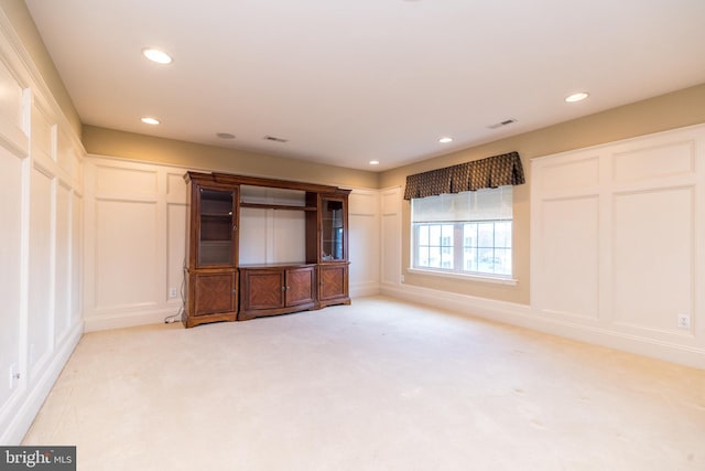 14 Komen Ct, Sellersville, PA 18960 - unfurnished bedroom featuring a decorative wall, light colored carpet, and recessed lighting