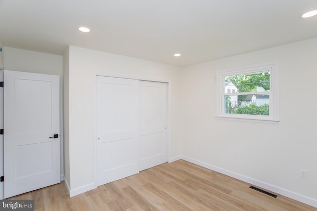 1102 Dolores Ln, Croydon, PA 19021 - unfurnished bedroom with light wood-style floors, baseboards, a closet, and recessed lighting