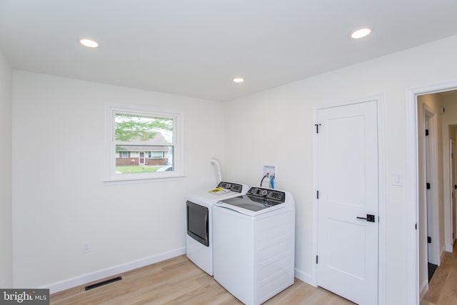 1102 Dolores Ln, Croydon, PA 19021 - laundry area featuring washer and clothes dryer, light wood-style flooring, recessed lighting, and baseboards