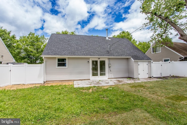1102 Dolores Ln, Croydon, PA 19021 - rear view of property featuring a gate, a shingled roof, and a patio area