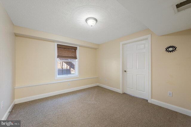 121 Carnmore Dr, Winchester, VA 22602 - unfurnished room with carpet floors, baseboards, and a textured ceiling